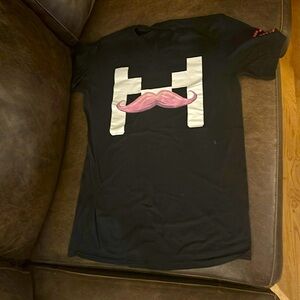 Women’s black t-shirt, uncertain of size, possibly junior size small in exc cond